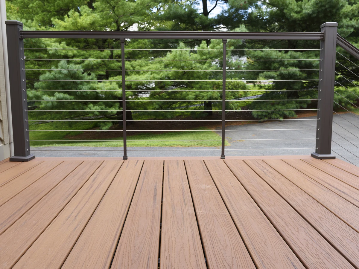 Wooden deck with metal railings treated and painted by Cambridge Decorators
