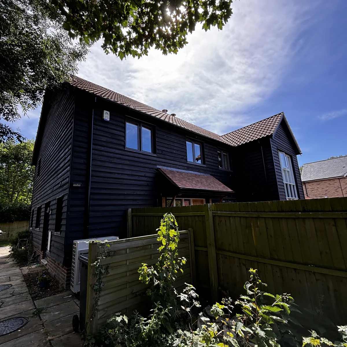 Black timber cladding elevation, freshly painted, Cambridge — Cambridge Decorators