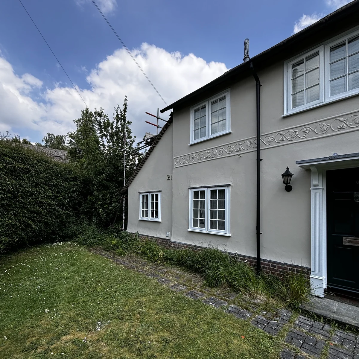 Cream render cottage exterior painted in Cambridge — Cambridge Decorators