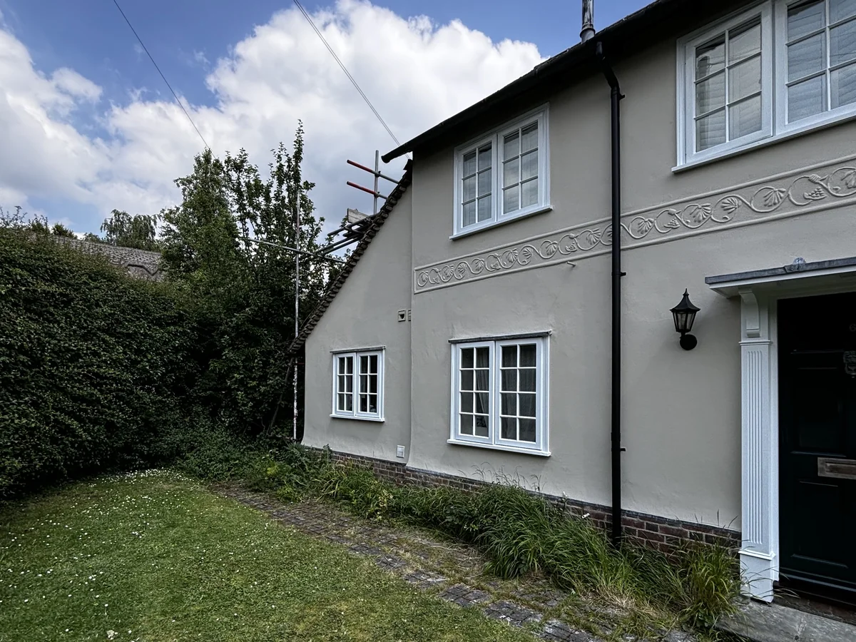 House painting in Cambridge — traditional cream render cottage — Cambridge Decorators