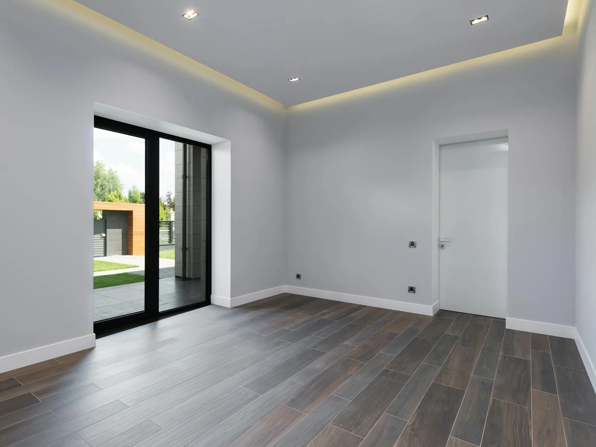 interior-painting-empty-grey-room-cambridge-decorators Interior painting in Cambridge by Cambridge Decorators — empty grey room ready for professional finish