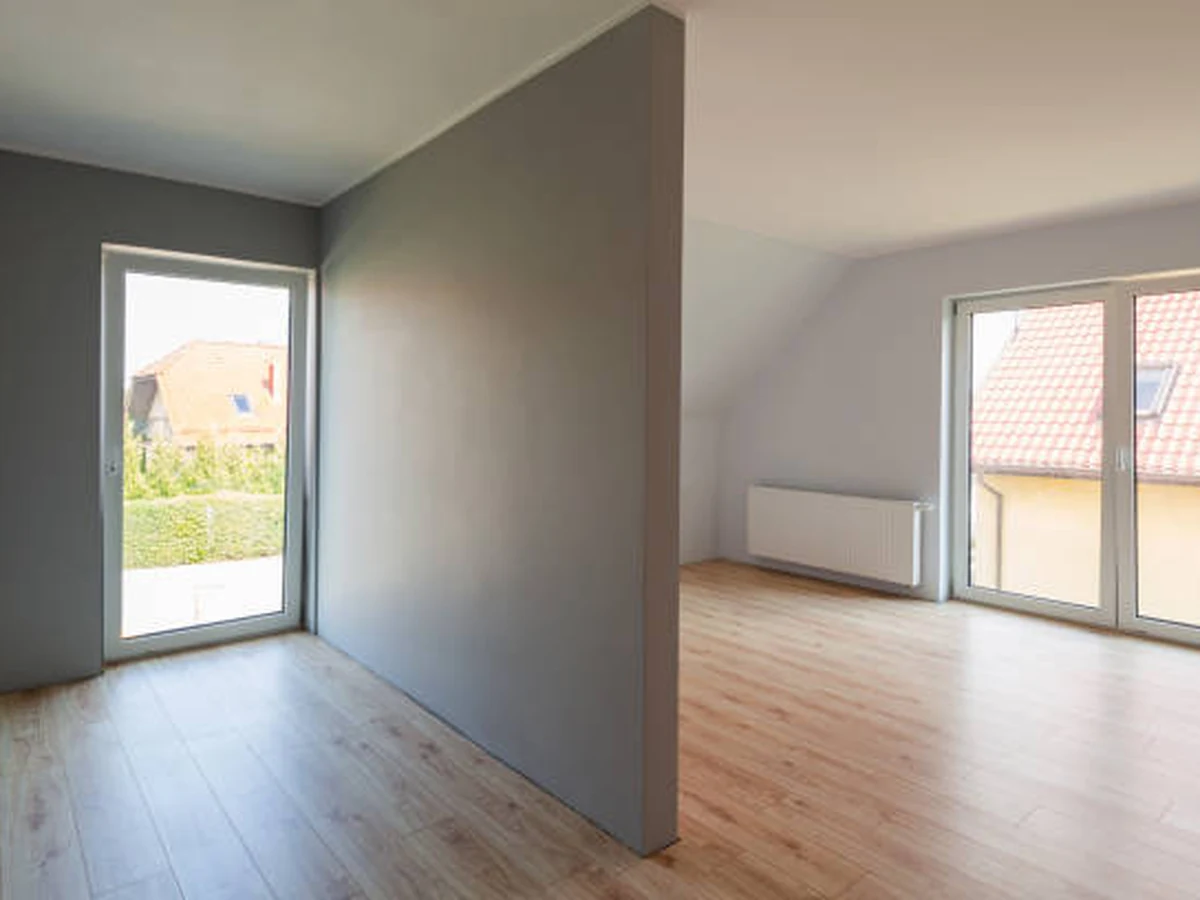 Plasterboard painting in Cambridge by Cambridge Decorators, freshly painted interior room with grey walls