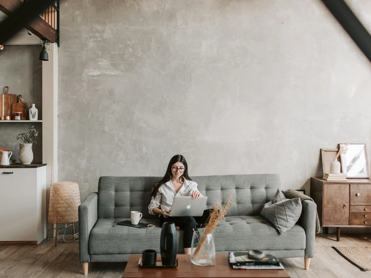 Woman working from home in a freshly painted room by Cambridge Decorators