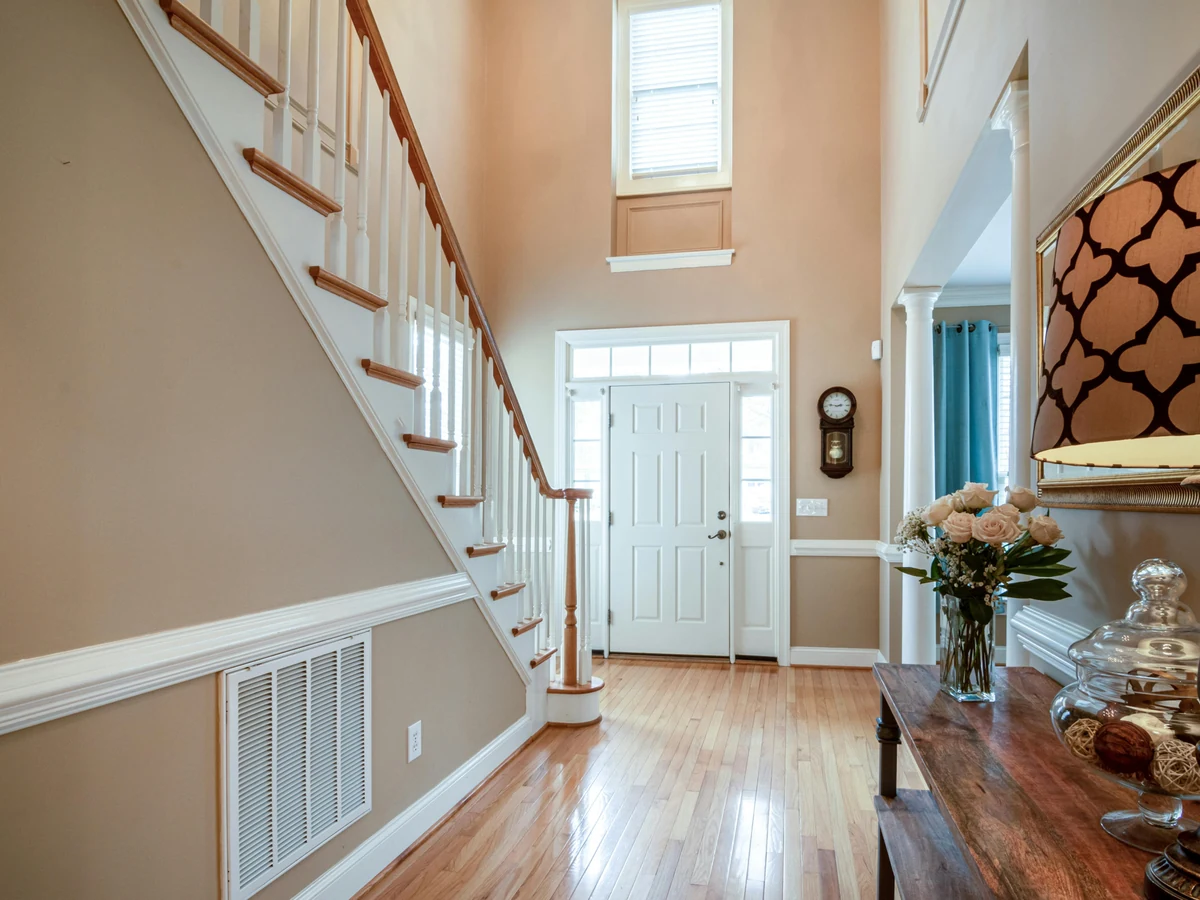 Two-tone staircase painting in Cambridge by Cambridge Decorators