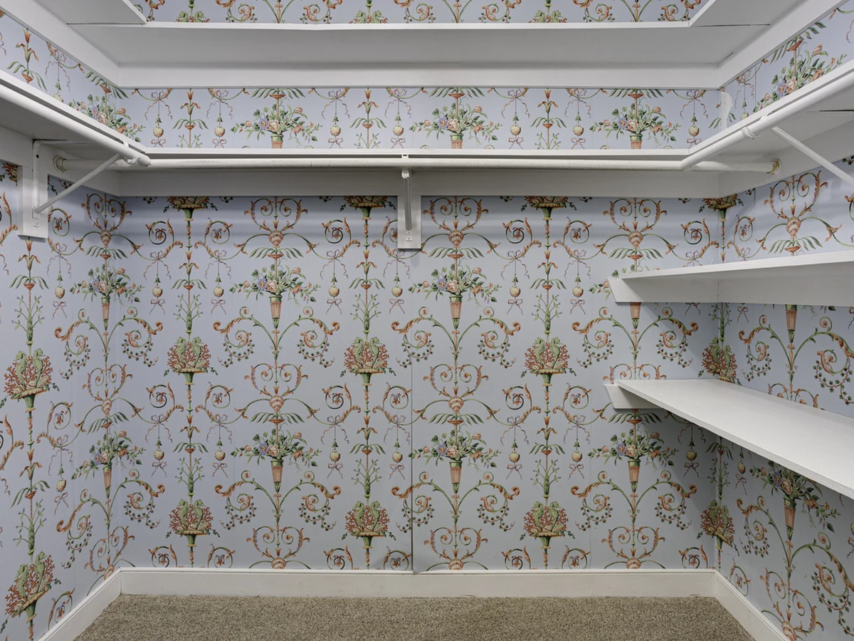 Wallpapering in Cambridge by Cambridge Decorators, fully papered closet interior with clean finish